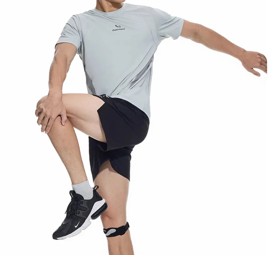 Men's black running shorts with laser-punched detail and four-point stitching on stretch spandex fabric.