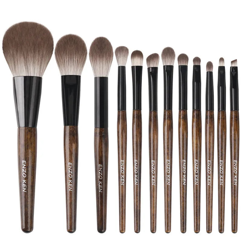 12-piece makeup brush set with artificial fibre bristles and wooden handles in PU storage bag