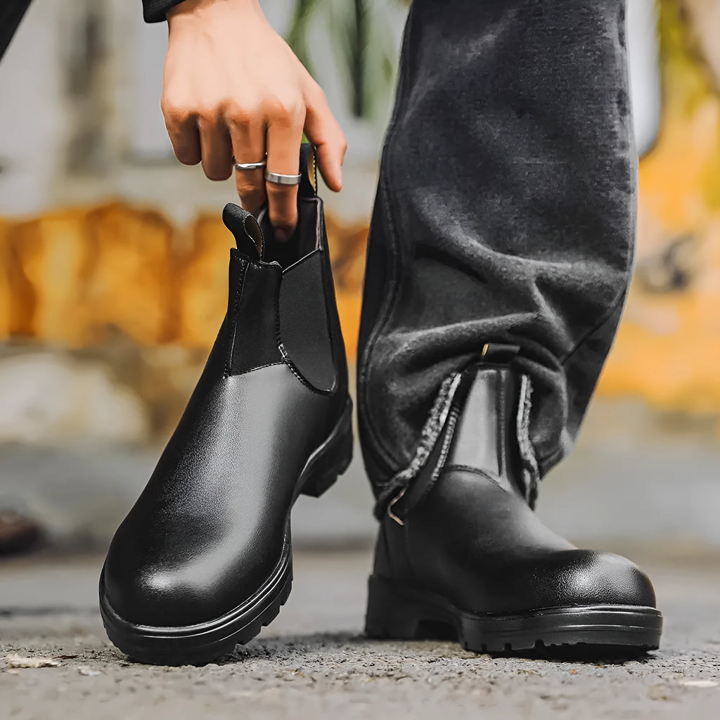 Vintage-style Chelsea boots with car suture detailing on artificial PU upper and beef tendon soles