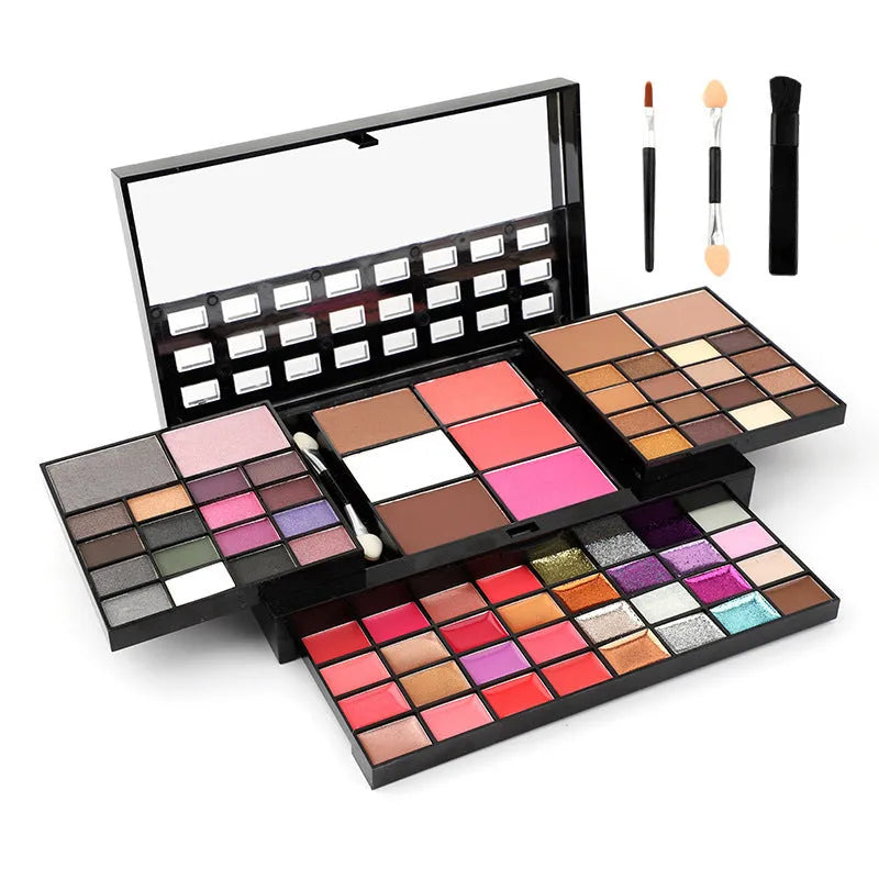 74 colour makeup palette open showing eyeshadows, lip glosses, and face powders with brushes