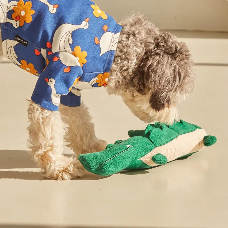 Green plush toy dog measuring 35cm long with soft fabric and interactive features