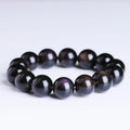 Polished crystal Pi Xiu bracelet with geometric beads in ice stone colour, showing size options on wrist.