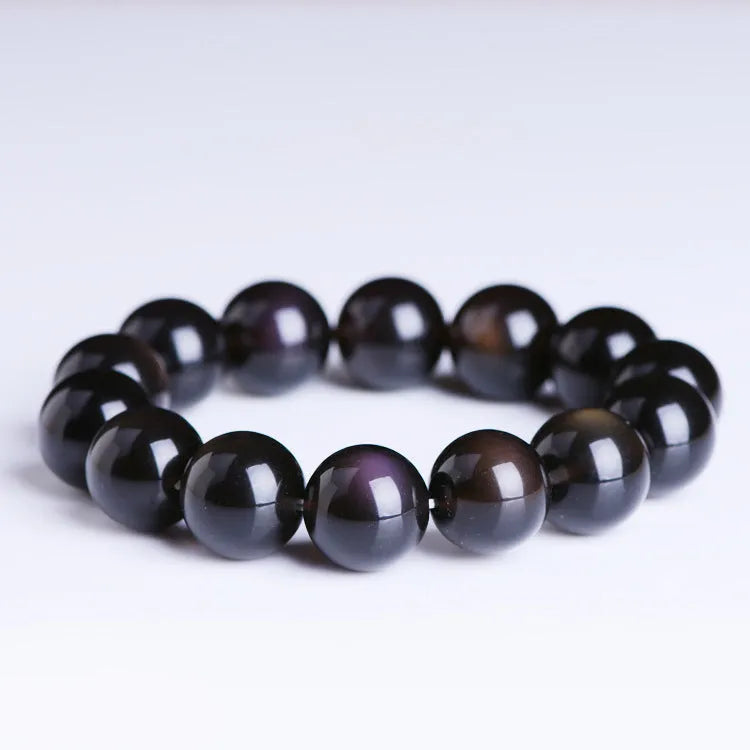 Polished crystal Pi Xiu bracelet with geometric beads in ice stone colour, showing size options on wrist.