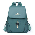 Women's leather backpack with textured material and three-dimensional pockets in street style