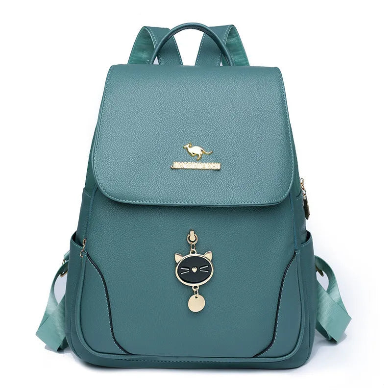 Women's leather backpack with textured material and three-dimensional pockets in street style
