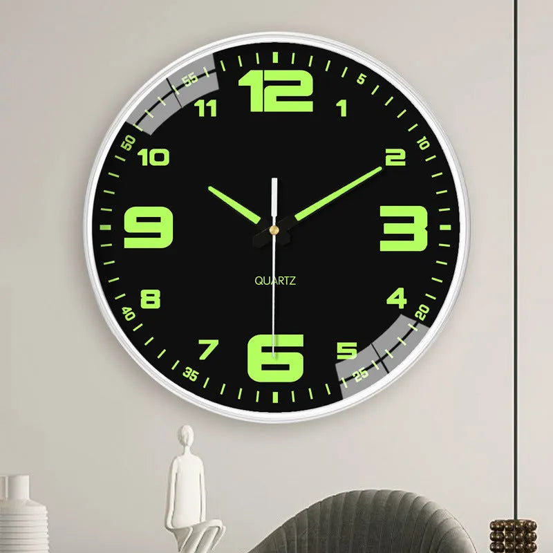 8 inch diameter modern wall clock with luminous hands on a wall.
