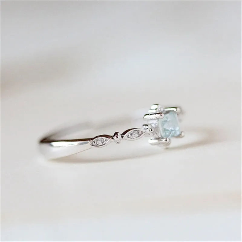 Rose gold copper ring on white background showing plain band design