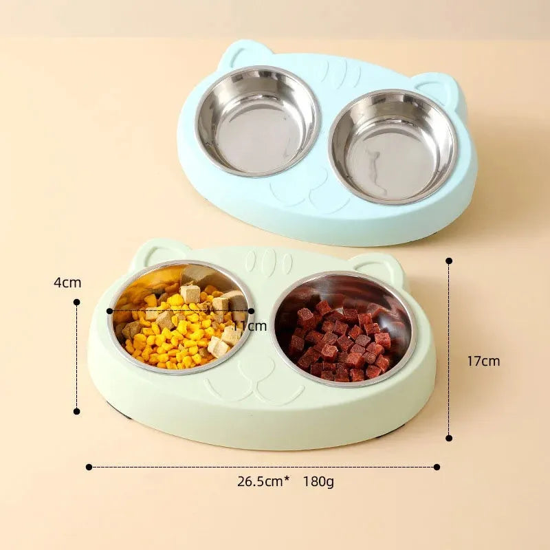 Blue macaron-shaped plastic pet feeder with two separate bowls for food and water.