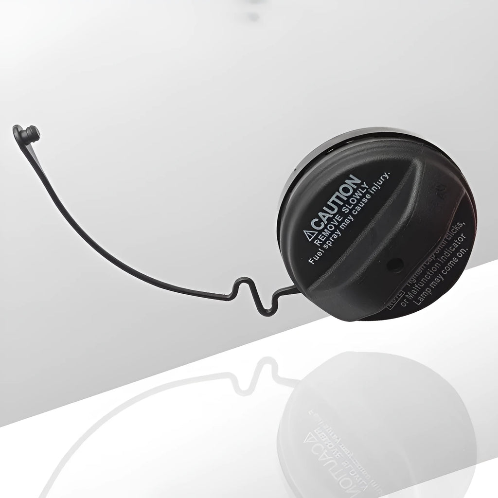 Toyota replacement snap-in fuel tank cap showing black plastic construction