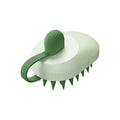 Handheld silicone dog bath brush with soft TPR massage bristles for hair removal during washing.