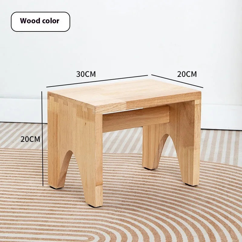Wooden shoe changing stool with distressed finish and bracket leg structure