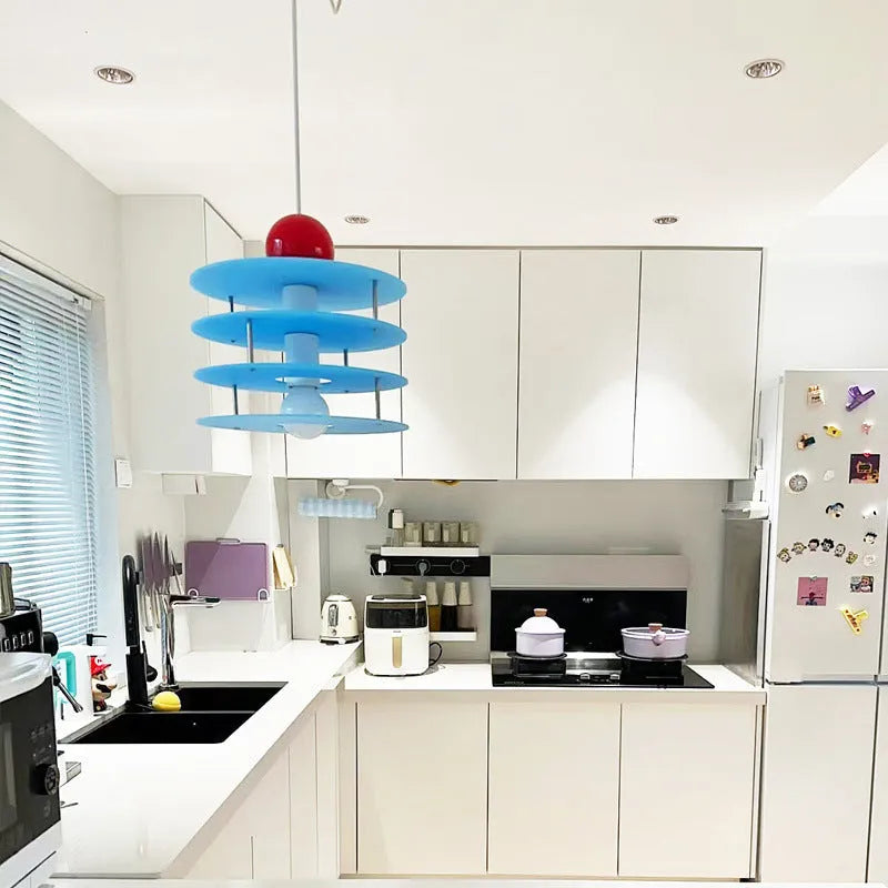 Modern Macaron PH5 adjustable chandelier with frosted glass shade in choice of white, blue, or orange.