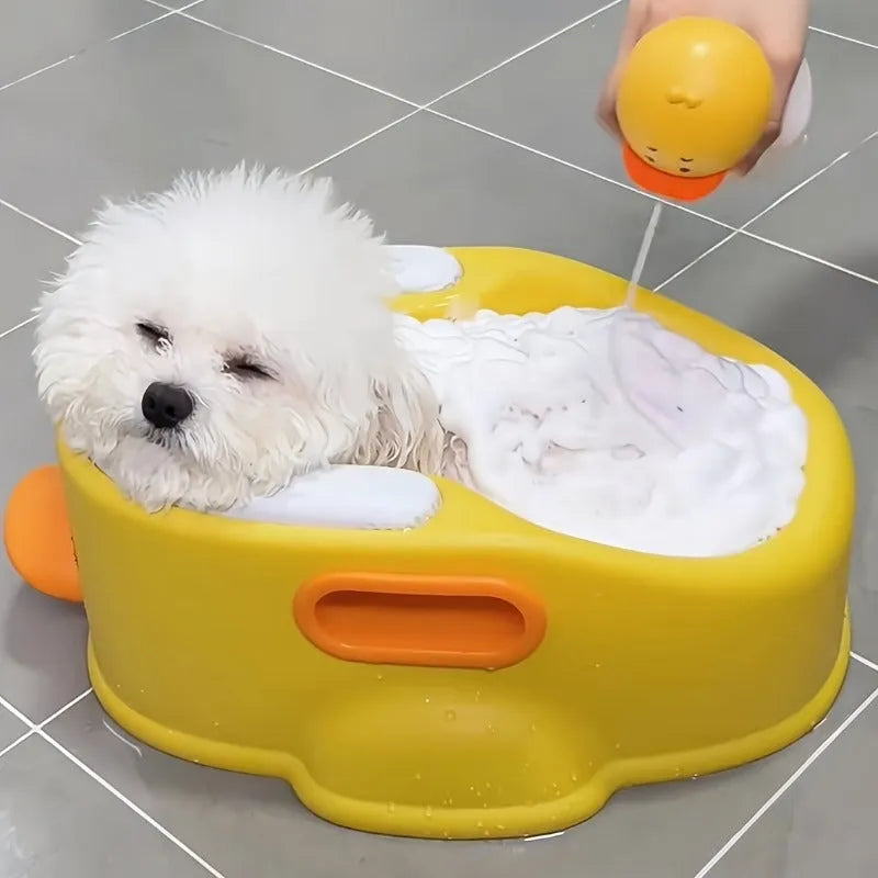 Blue PVC bathtub shaped like a duck for washing small to medium dogs and cats.