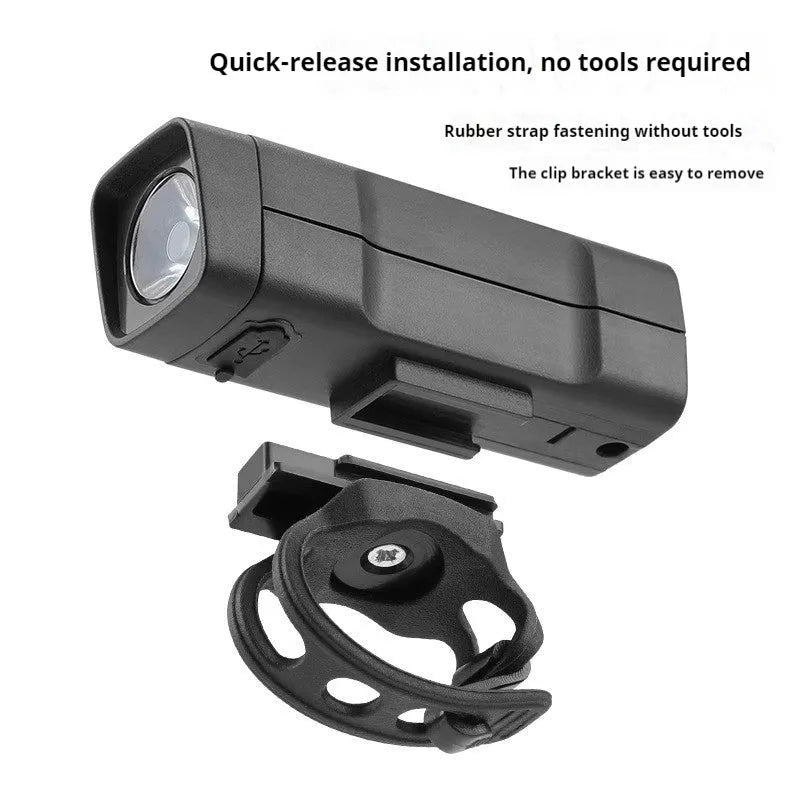 USB rechargeable bicycle headlight mounted on bike handlebars with 100 lumens brightness for night riding