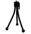 Small aluminium tripod with ball head collapsed to 110mm height next to mobile phone