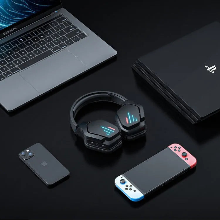 Luminous black wireless over-ear gaming headphones with adjustable headband showing ear cups and included 3.5mm cable