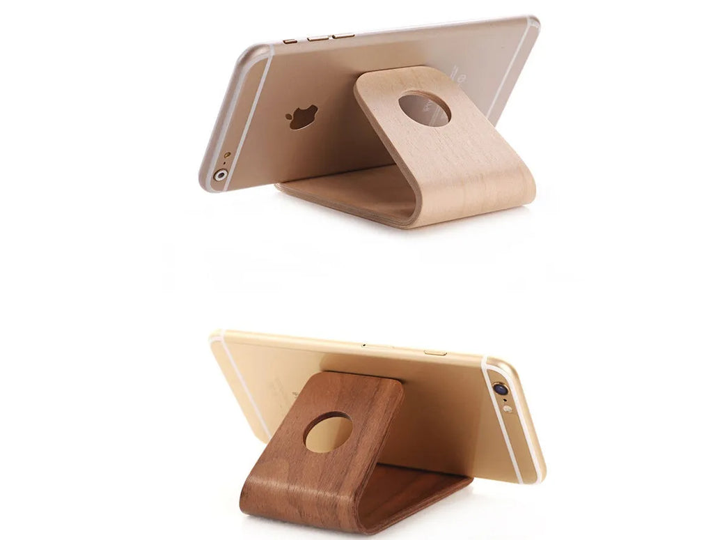 Solid wood phone stand for iPhone in natural walnut or white maple finish with minimalist bracket design