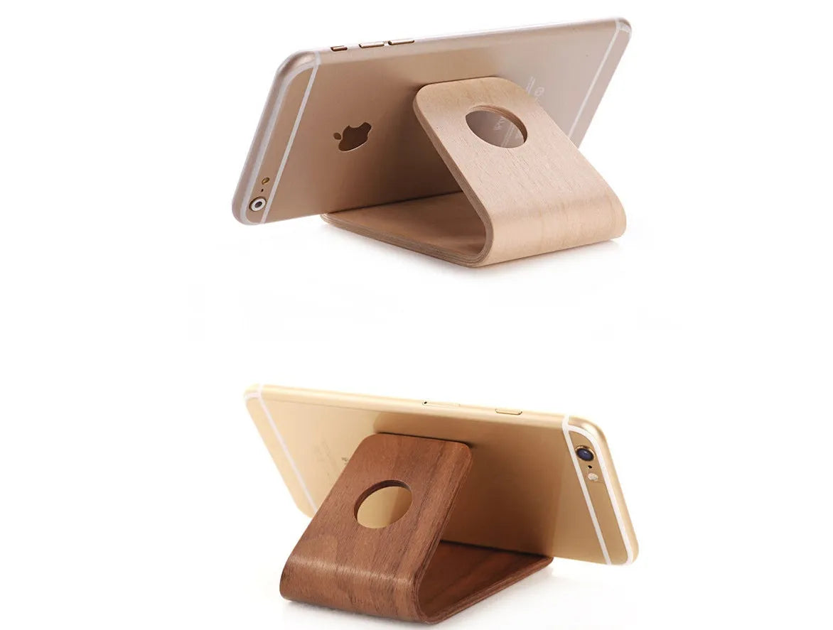 Solid wood phone stand for iPhone in natural walnut or white maple finish with minimalist bracket design