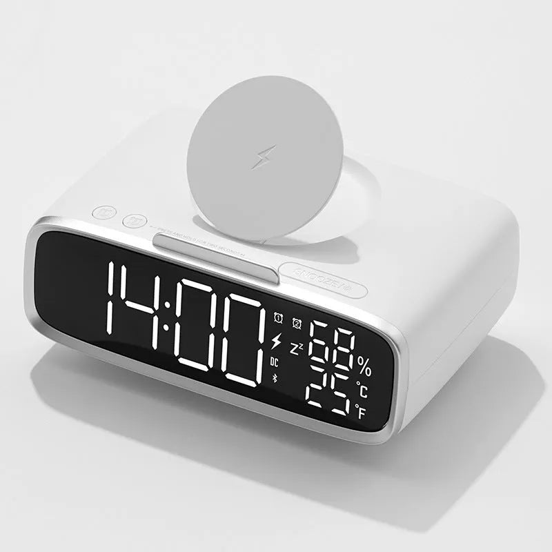 White wireless charger Bluetooth speaker with night light functionality on wooden surface
