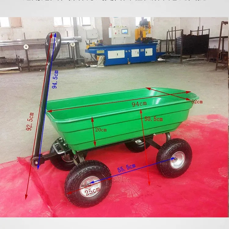 Green four-wheel dumptruck with tipping bed, model TC2145, for garden and farm material transport.