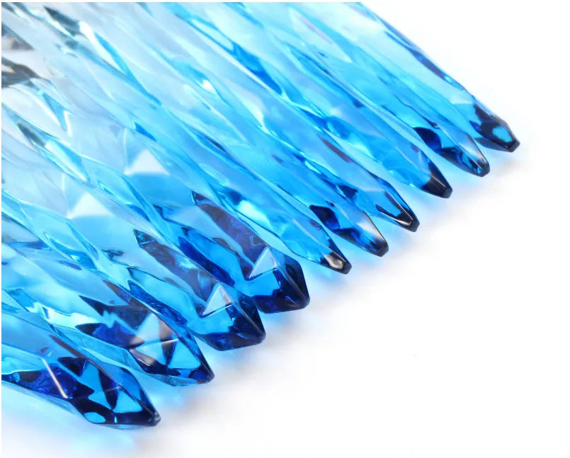 Ten clear crystal-handled foundation brushes with artificial fibre bristles in black, blue, red, and yellow colours