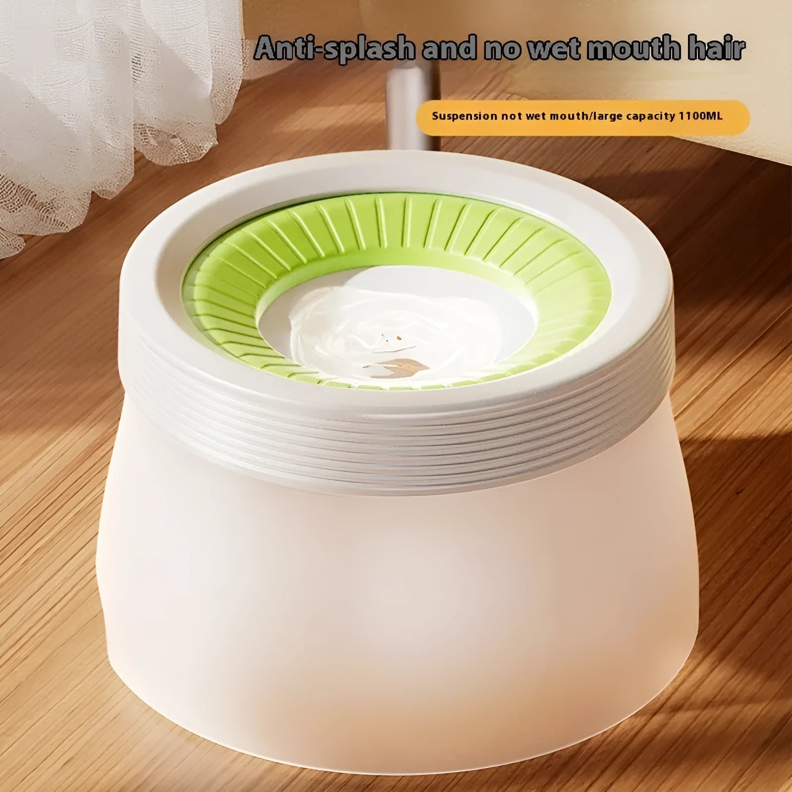 Green PP silicone suspended pet water bowl for dogs and cats on a white background