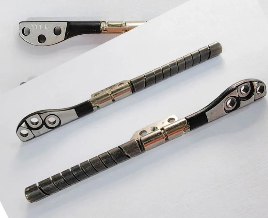 A1286 MacBook Pro 15-inch screen shaft pair in foam packaging