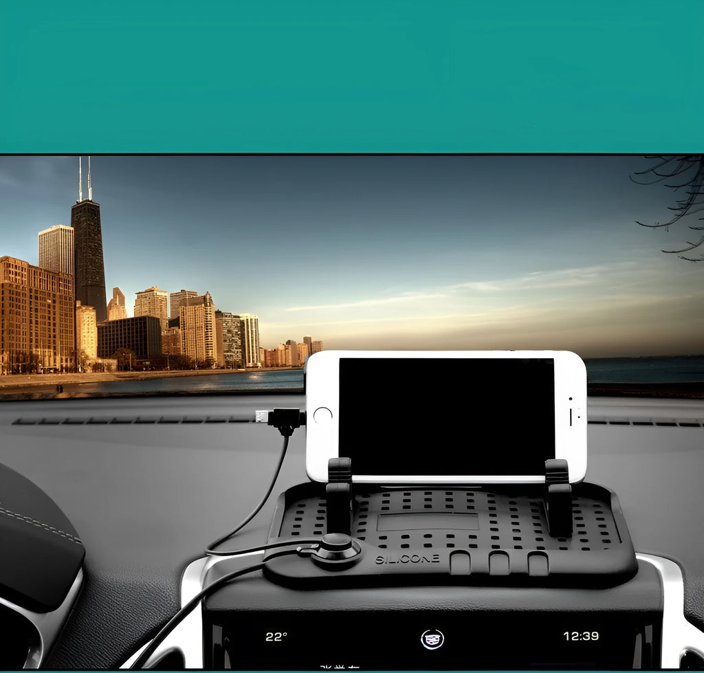 Black silicone car charging bracket with magnetic holder and three charging ports on a dashboard