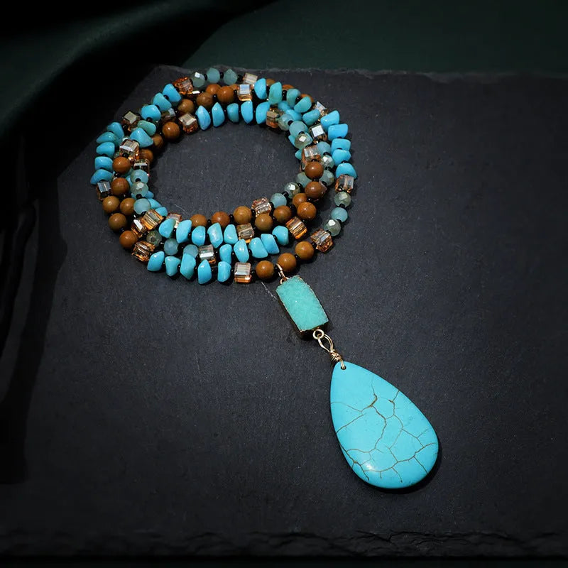 Turquoise blue imitation mineral pendant necklace with mixed gem inlaid details on ball bead chain