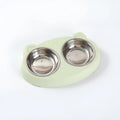 Blue macaron-shaped plastic pet feeder with two separate bowls for food and water.