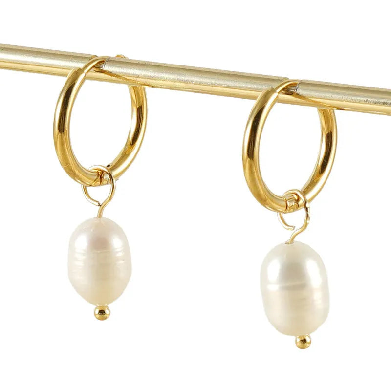 Geometric pearl earrings with gold electroplating on stainless steel and titanium steel construction
