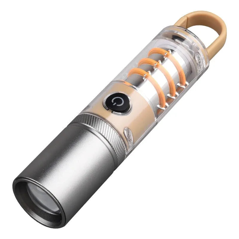 Orange and beige multifunctional flashlight with magnetic hook and optical zoom lens.