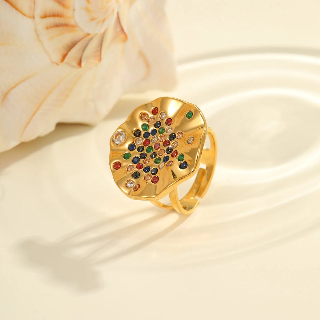 Open mouth geometry ring with colourful crystal inlays and electroplated titanium steel finish