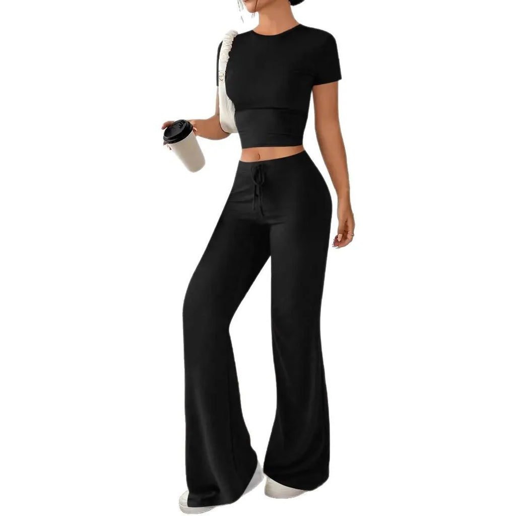 Black women's co-ord set with high waist trousers and a regular sleeve t-shirt