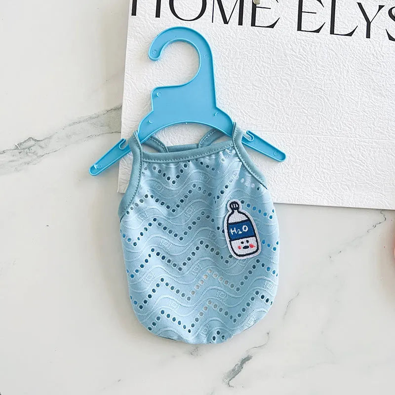 Light blue breathable mesh dog vest with an adjustable strap on a mannequin.