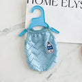 Light blue breathable mesh dog vest with an adjustable strap on a mannequin.