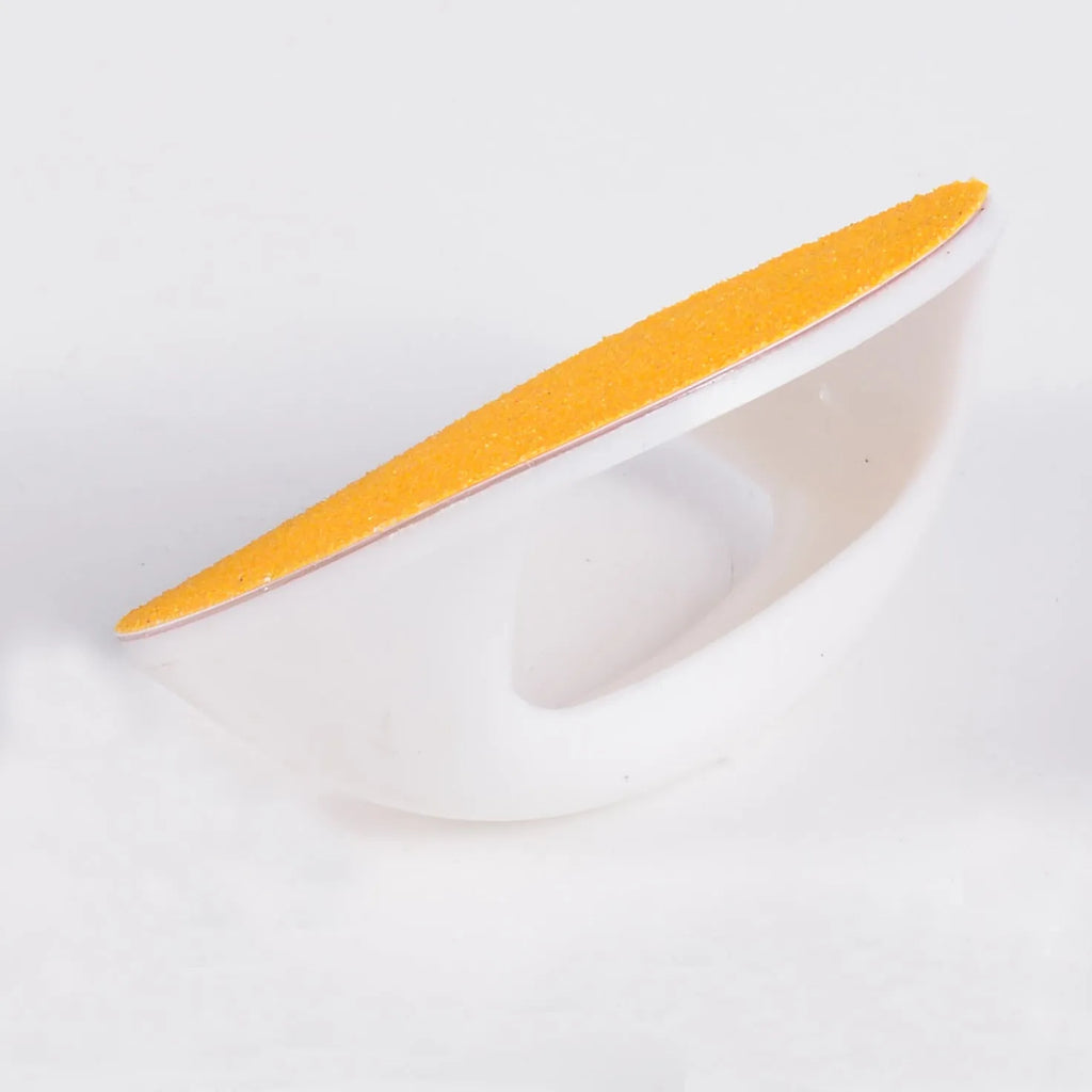 Dog nail scratch board with ergonomic handle showing sandpaper surface and colour options