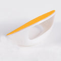 Dog nail scratch board with ergonomic handle showing sandpaper surface and colour options