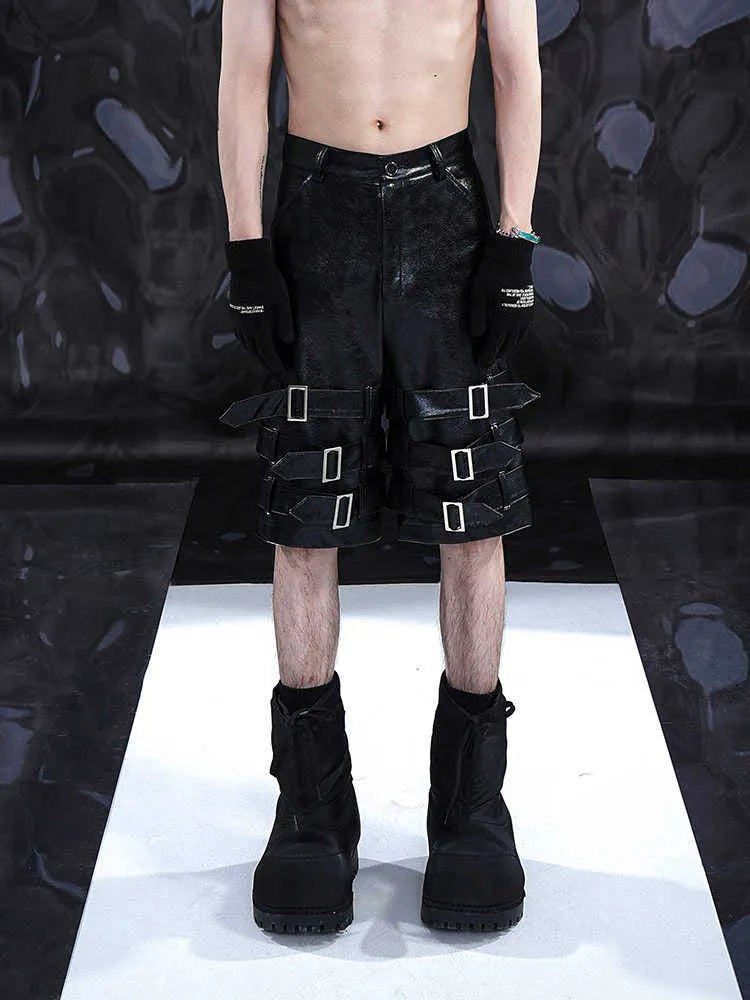 Men's black PU leather casual cropped shorts with an elasticated waistband.
