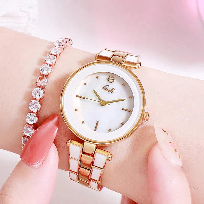 Round white dial ladies quartz watch with stainless steel strap and rose gold accents