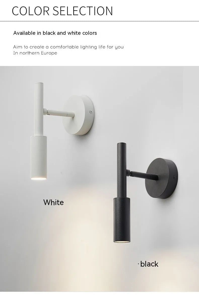 Modern wrought iron wall lamp in black with three colour light options for bedroom or living room
