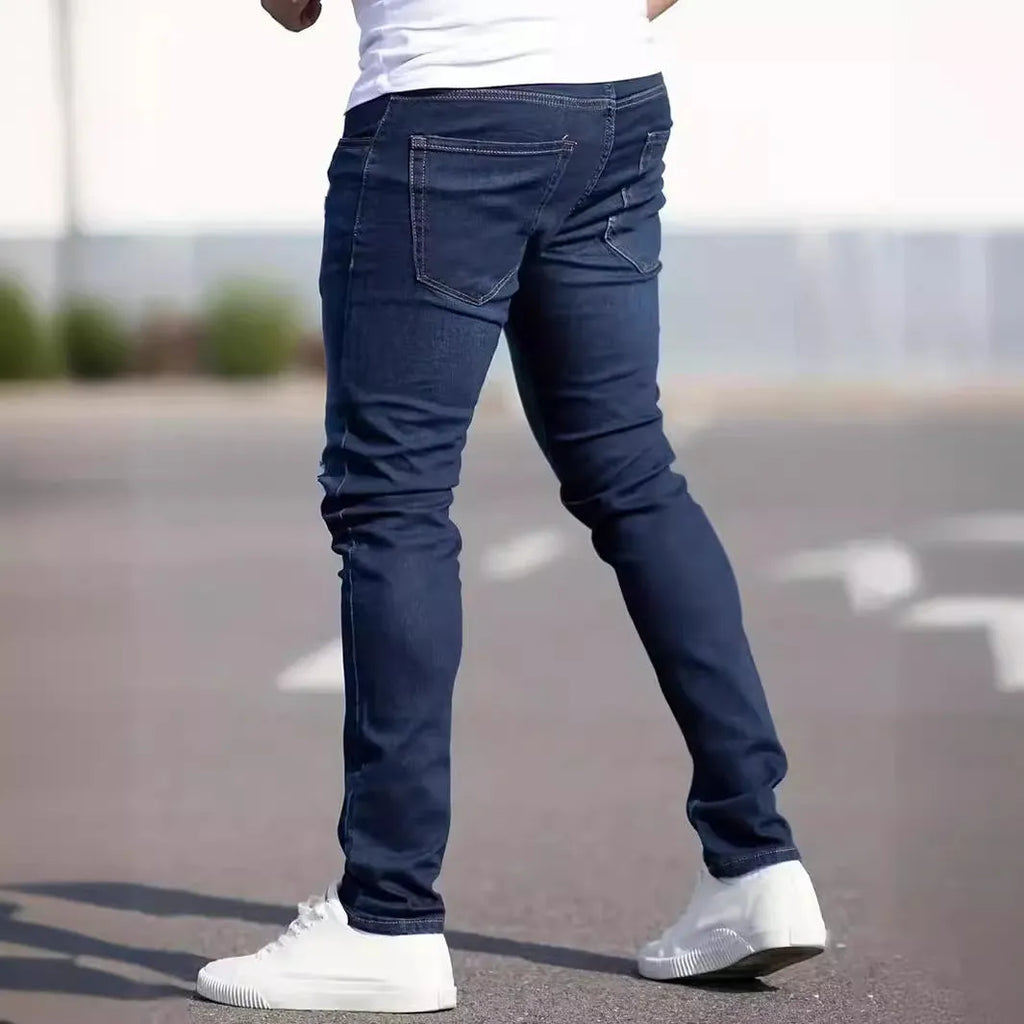 Men's dark blue slim jeans with medium elastic cotton fabric and skinny leg style