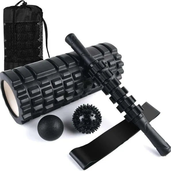 Black foam roller massage stick with gear design, 33cm long, on a plain background.