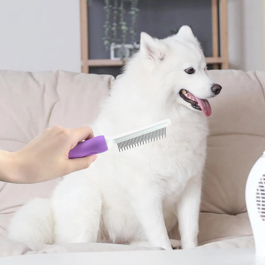 Purple pet detangling comb with stainless steel teeth on wooden surface