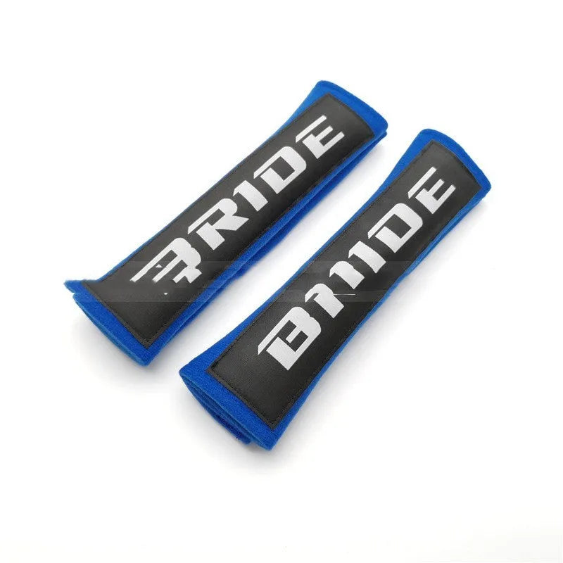 Car seat belt shoulder pads in black, blue and red with cotton fabric and sponge padding