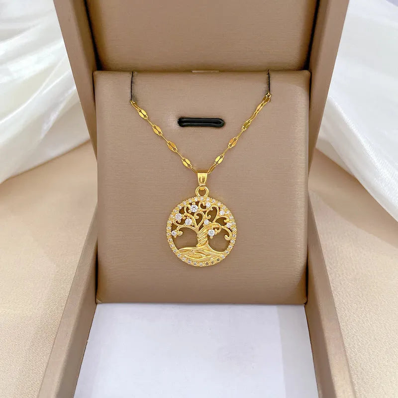 Gold-plated women's necklace with detailed lucky tree pendant featuring zircon stones and mother of pearl shell