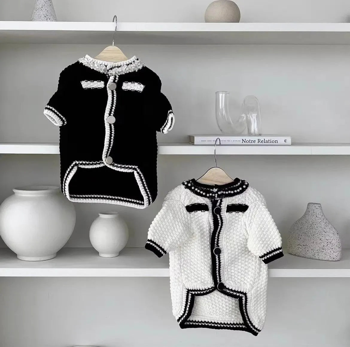 Korean style white dog sweater with pearl collar on small dog showing Princess cut design