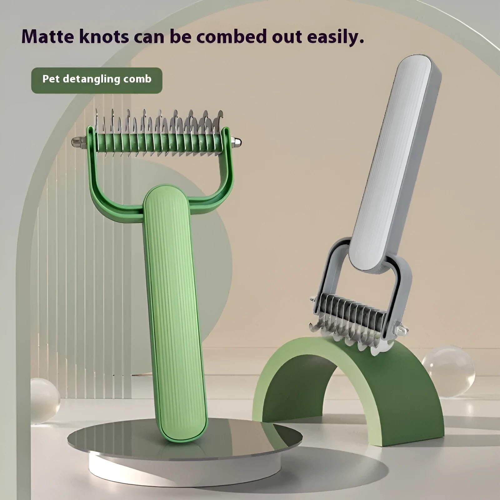 Green and grey dog grooming comb for unknotting hair, shown in large and small sizes