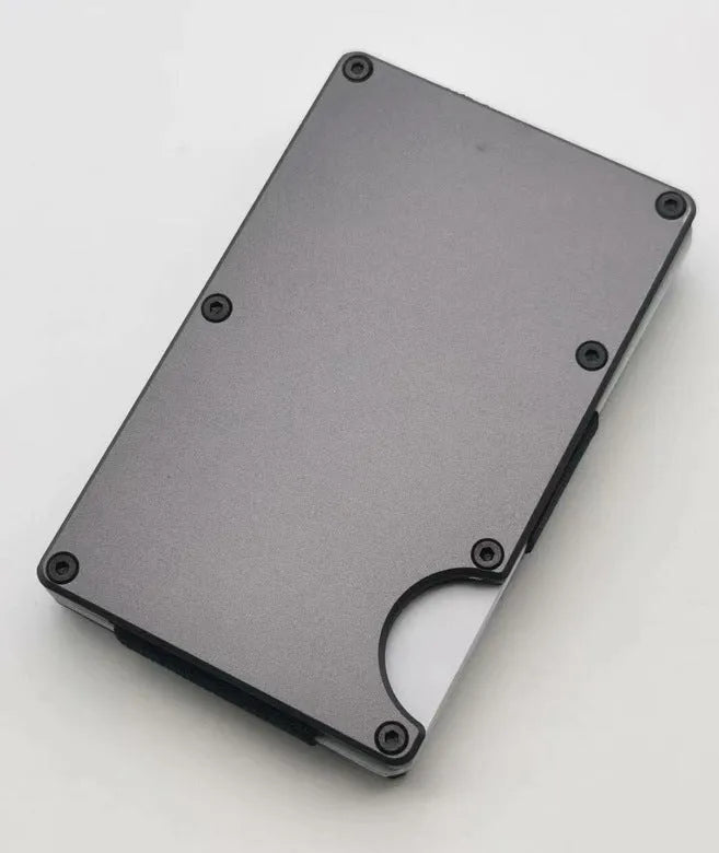 Carbon fibre credit card wallet with aluminium alloy grey finish showing anti-theft RFID protection features