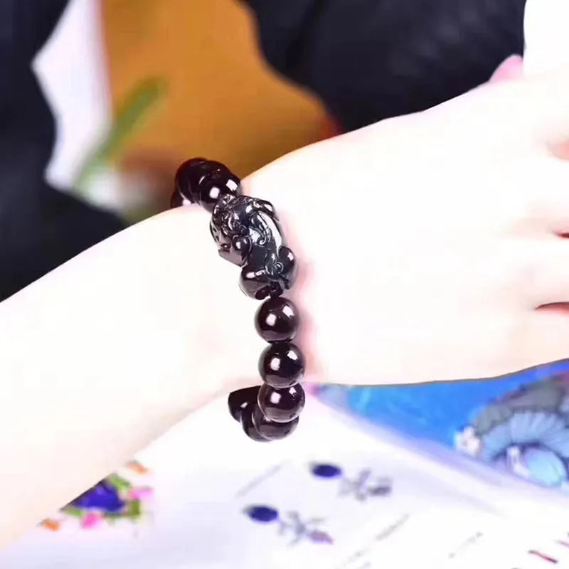 Ice colour eye obsidian crystal bracelet with stretch elastic on wrist